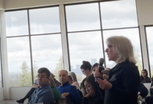 WSPTA Advocacy Committee member Dr. Gwen Loosmore poses a question to the Washington State legislators at the 41st Legislative District Town Hall on March 22, 2025